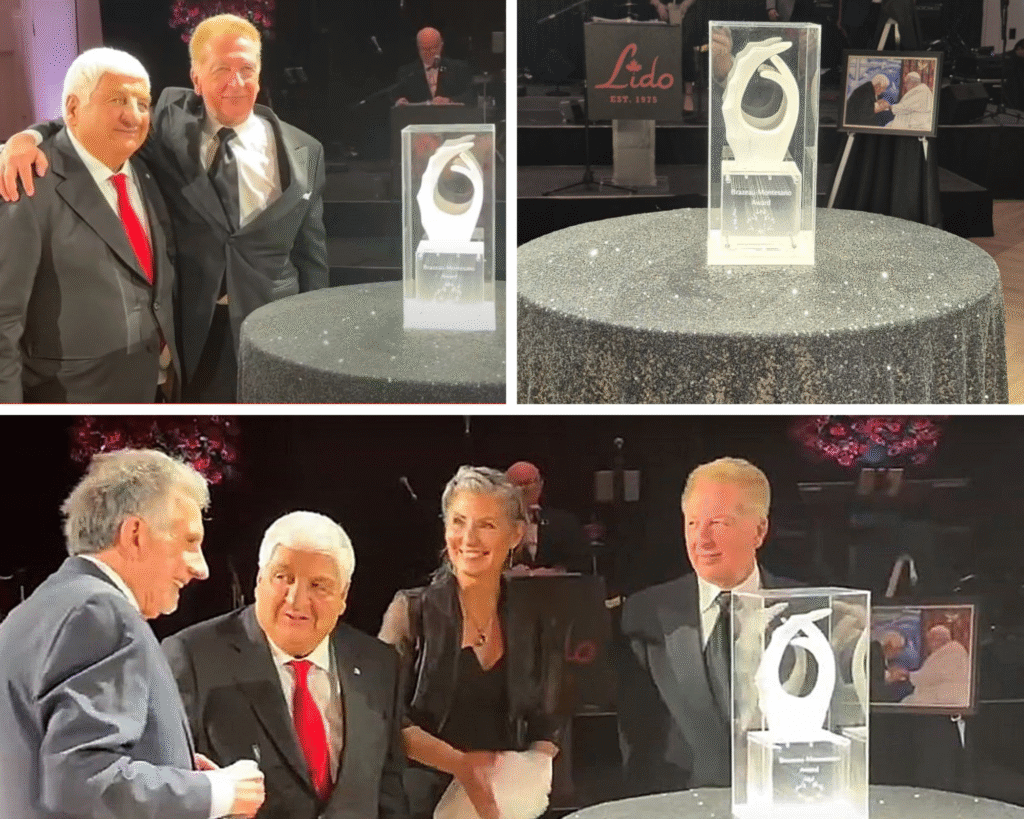 Nonprofit award ceremony with smiling attendees and elegant display of the trophy on a glittering table.